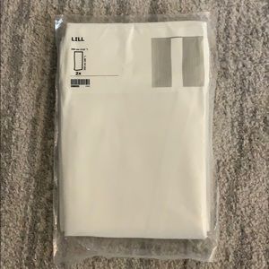 White sheet curtains